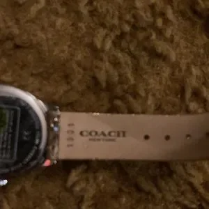 Watch by Coach in a shiny bold gold leather strap w/1 inch diameter face Coach | Accessories | Watch By Coach In A Shiny Bold Gold  main image 2